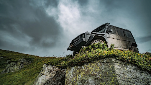 Best off-road car - Car on top of a rocky hill